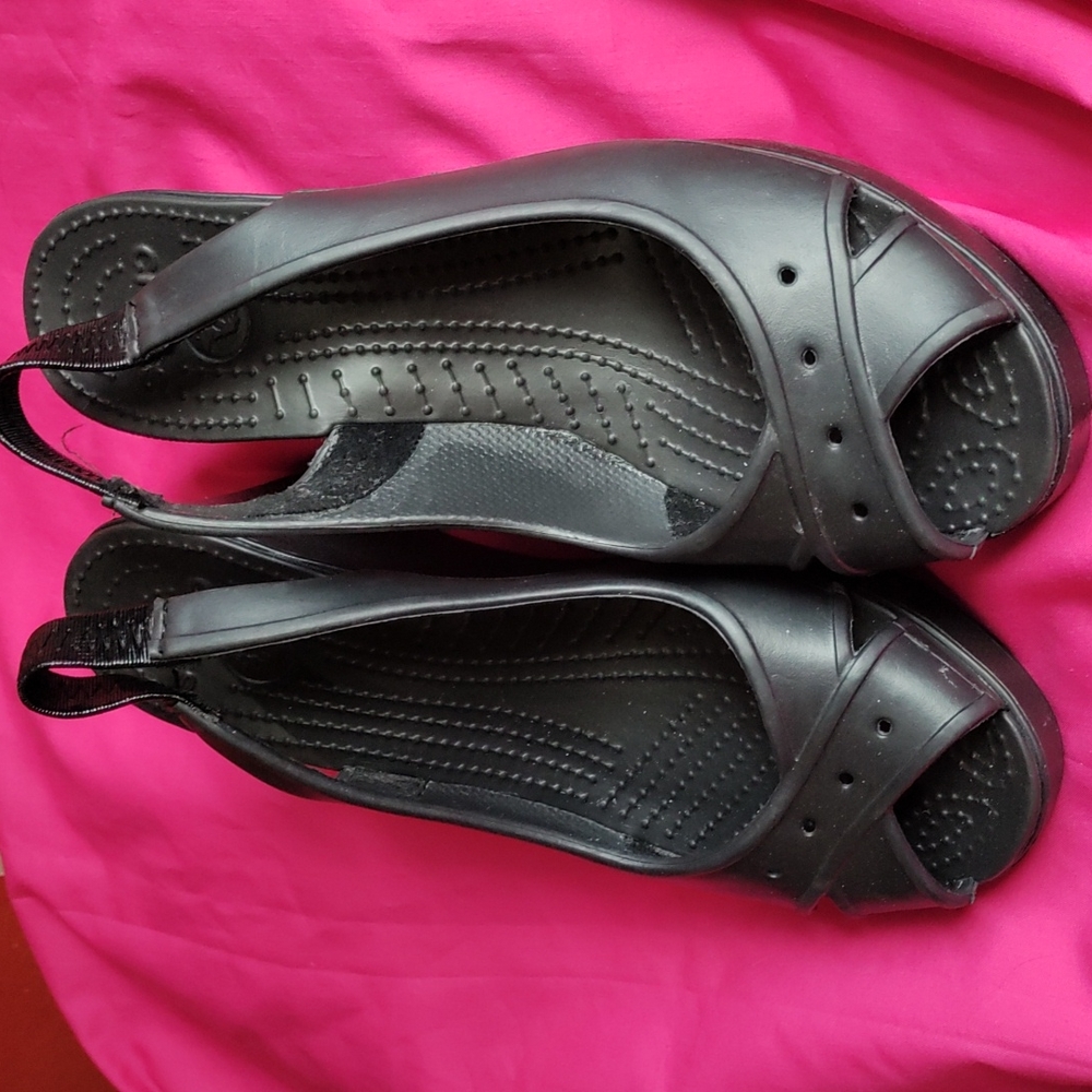 Crocs black peep toe wedges.